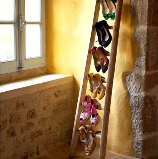 Shoes Displayed On a Ladder Photo